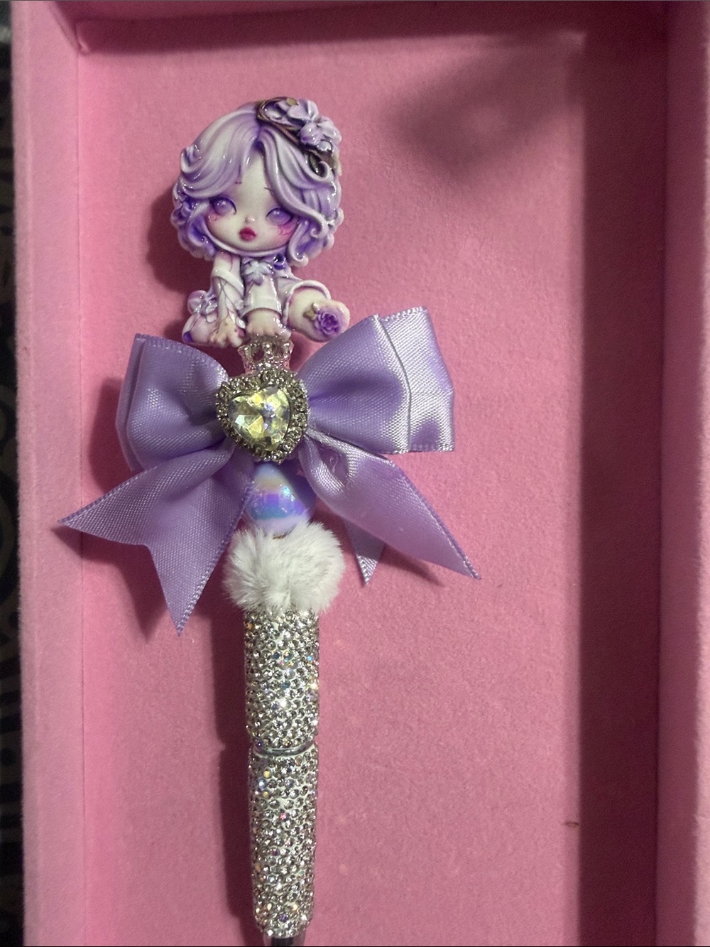 Purple Skull Pandarhinestone beaded pen with bow.